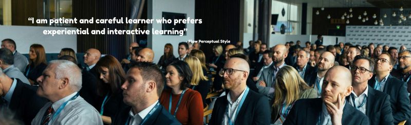 A group pf people attending a business seminar and the quote: "I am patient and careful learner who prefers experiential an interactive learning" Attributed to a person with the Flow Perceptual Style