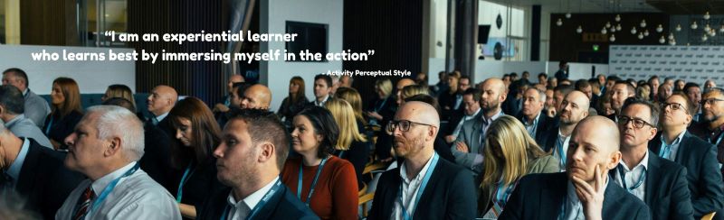 A group pf people attending a business seminar and the quote "I am an experiential learner who learns best by immersing myself in the action" - Attributed to a person with the Activity Perceptual Style